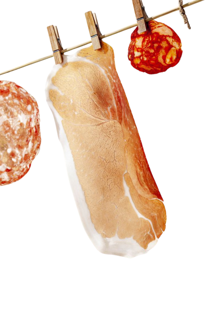 Clothesline hung with prosciutto, salami and deli cuts — quality meat Neighbours Tofino BC