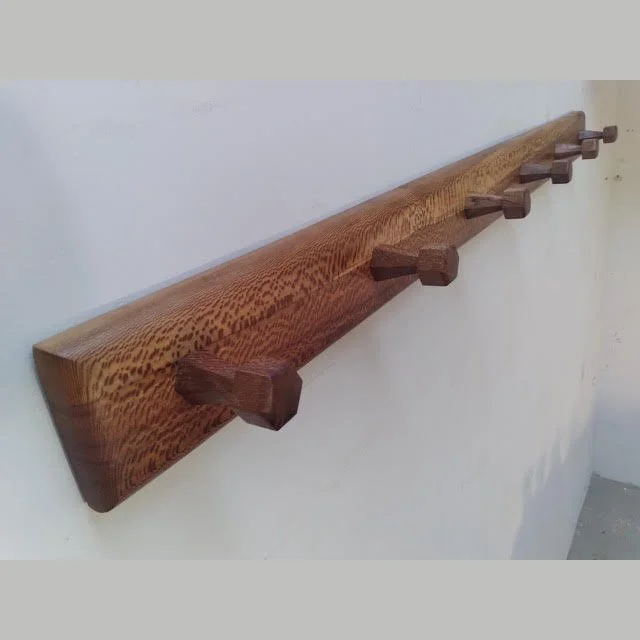   Bill Reinthaler 
Sangha Woodworking   
recycled & salvaged wood sculptural coat racks 
977 Lincoln Street