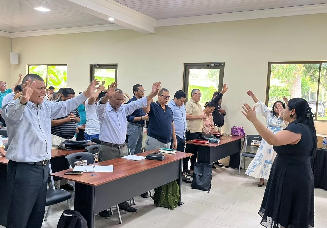 Geometric drawing of an outline square with sections divided by vertical, horizontal, and half circle lines.