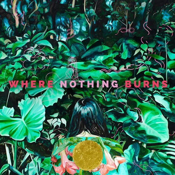A person with long dark hair viewed from behind, surrounded by dense green tropical leaves and pink vines, with pink text overlay that reads 'WHERE NOTHING BURNS'.