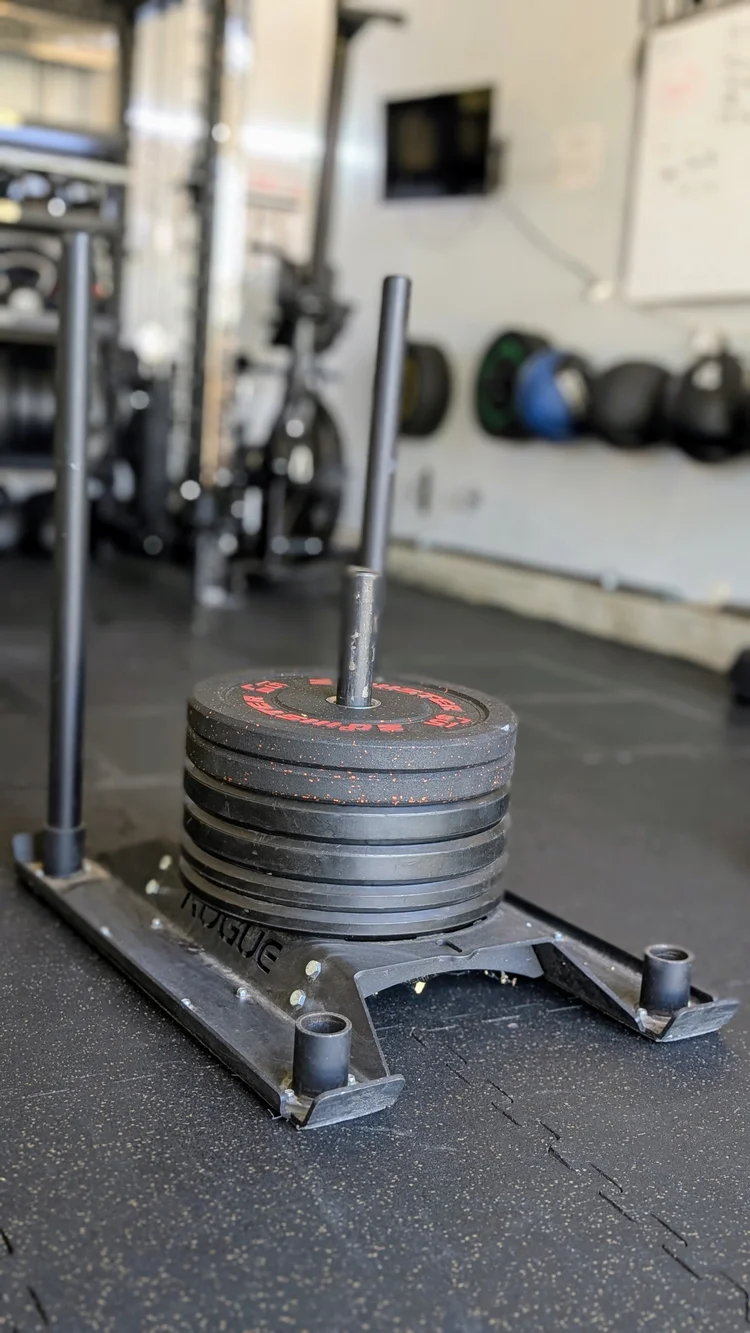 Loaded push sled at Tribe Fitness