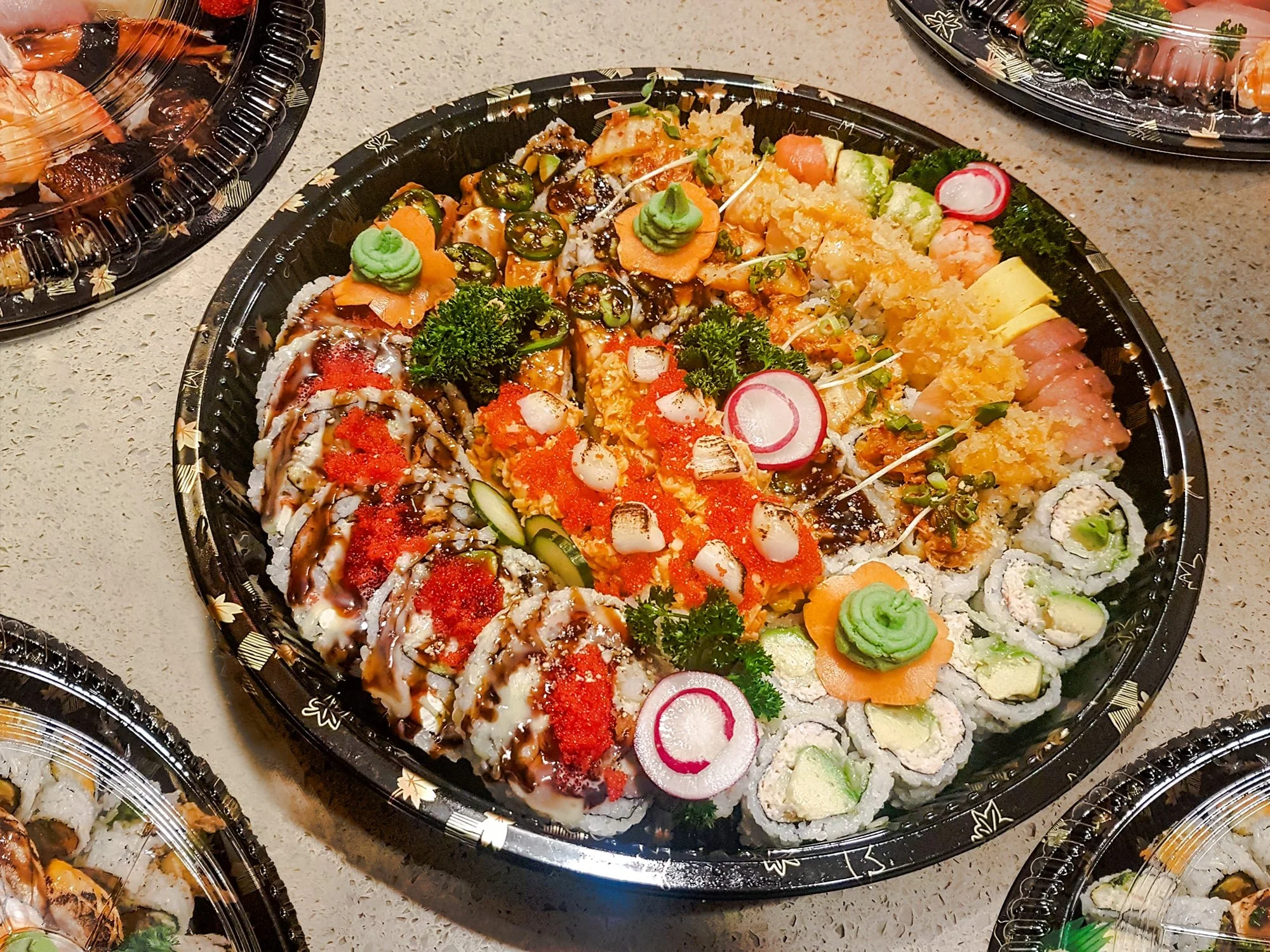 Party tray special: a complimentary salmon crunch salad or salmon crunch roll with any party tray order