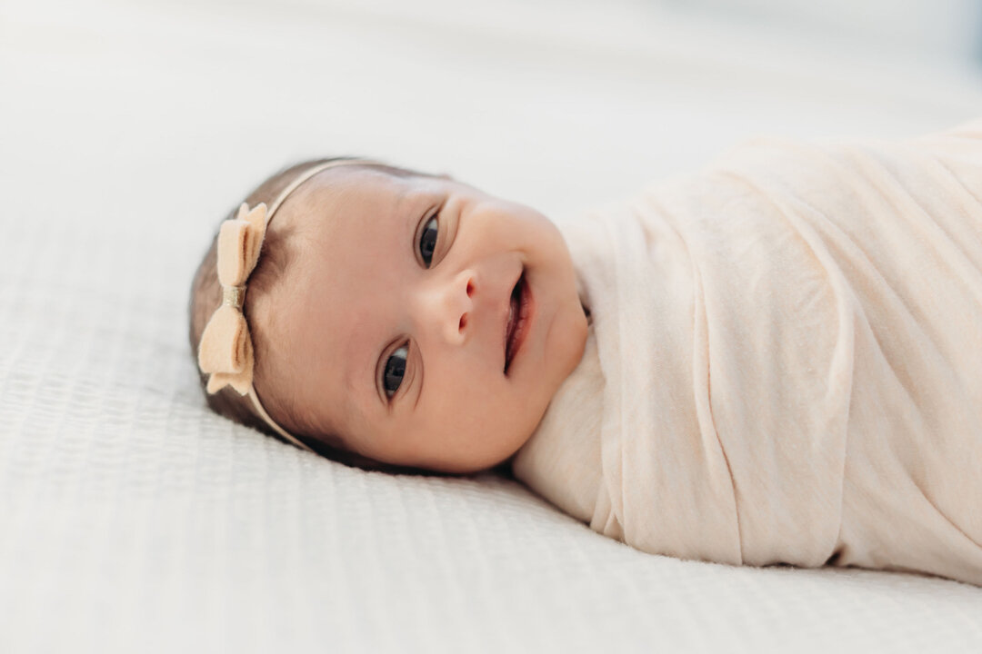 I'm going to let you in on a little secret...there are so many sleepy newborn photos out there but most babies DO NOT sleep through the entire session. It's actually super rare that a baby is asleep when I arrive and still asleep when I leave. If you