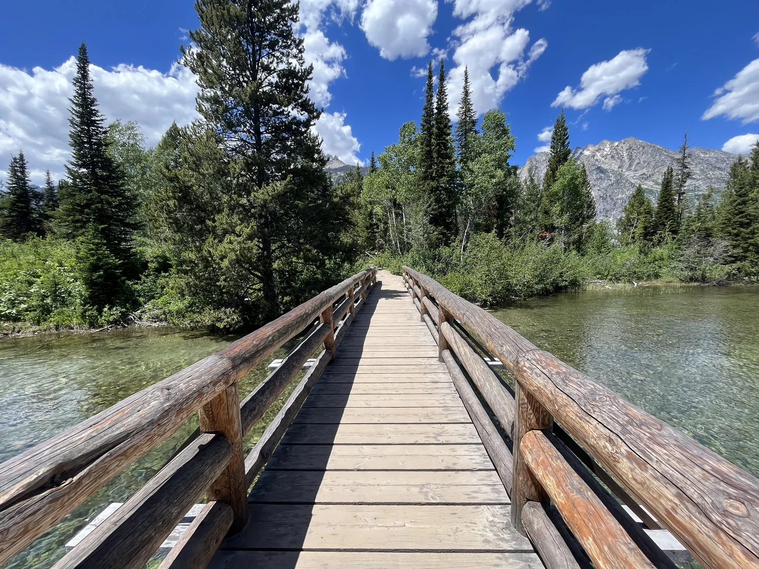 Hiking the Hidden Falls Trail via Jenny Lake in Grand Teton National ...
