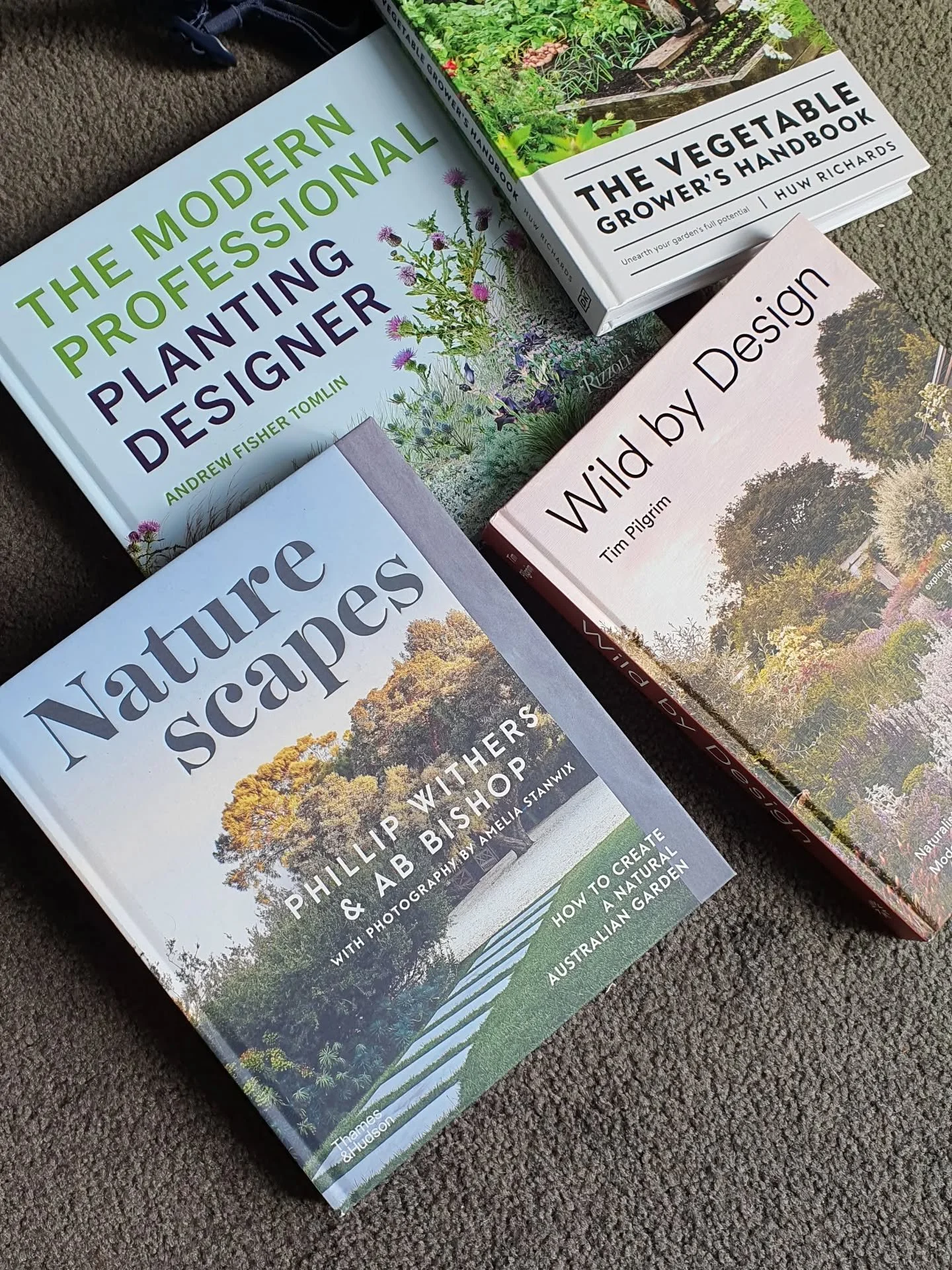 I'm back from a week away of music, nature and new landscapes, and ready to get into my @booktopiabooks delivery! Happy to report my tomato seedlings all survived 🍅

@dragon_dreaming_festival @phillip_withers @thehabitatguru @fishertomlin @huwsgarde