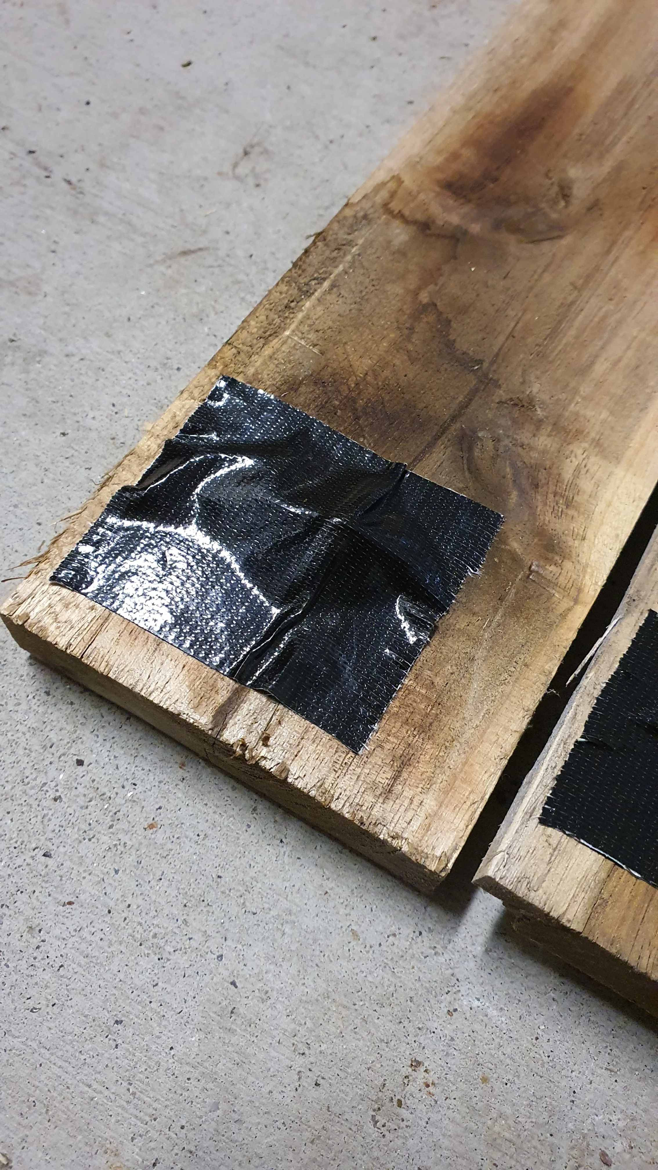 Cover nails with tape for safety