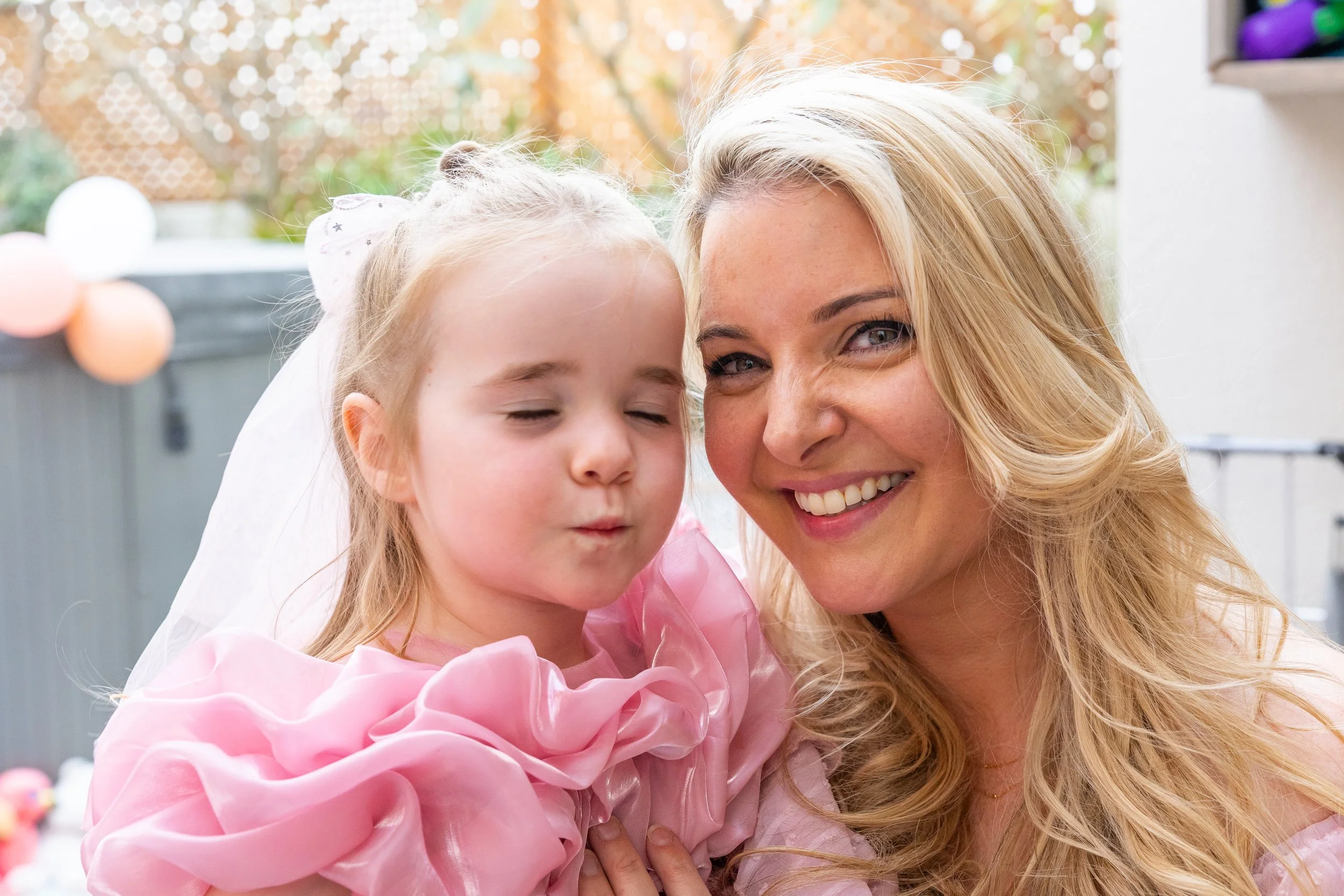 Mum and Toddler Posing at Birthday Party Lifestyle Photography.jpg