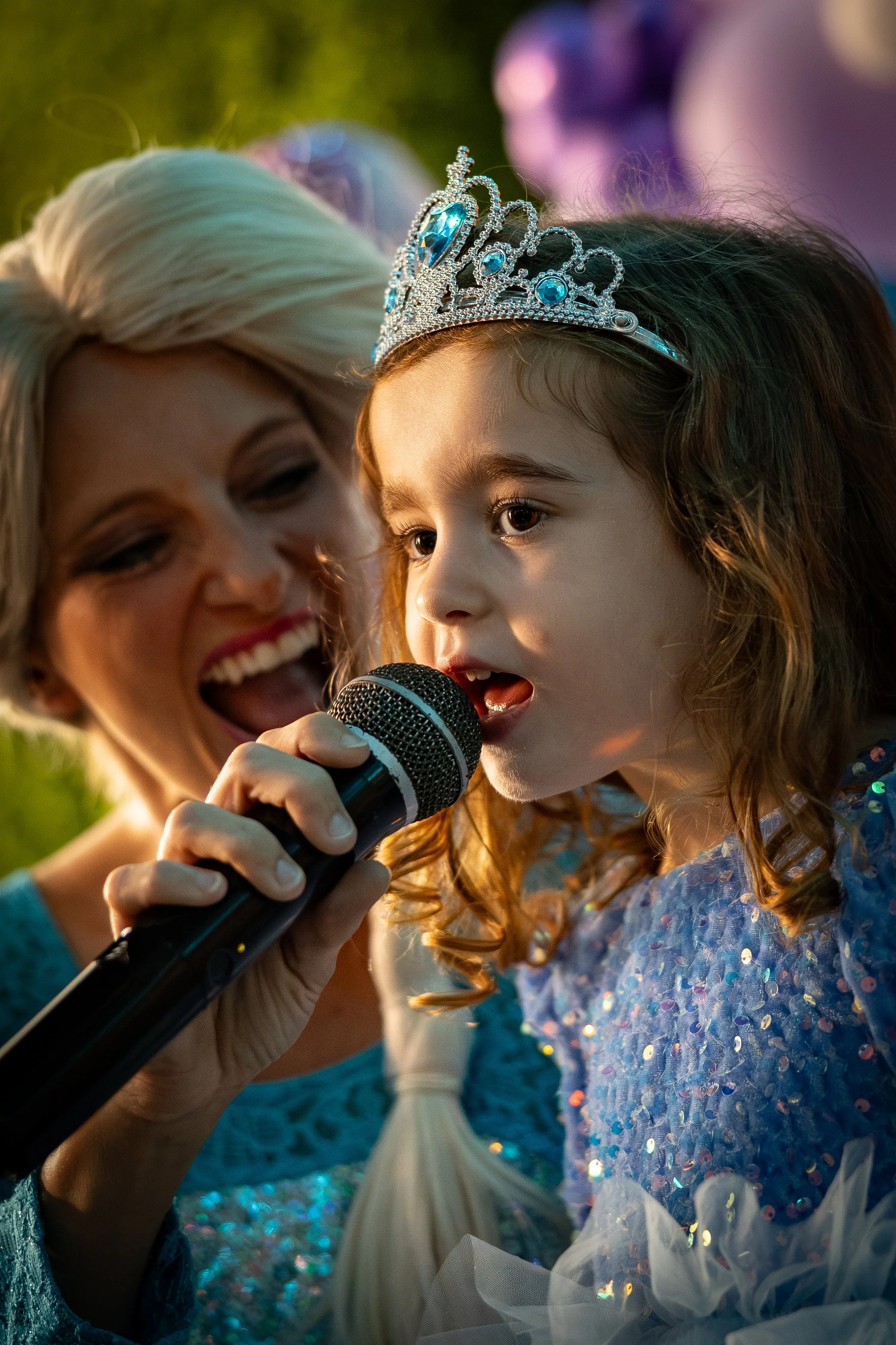 Girl Dressed as Princess Singing at Frozen Theme Party.jpg