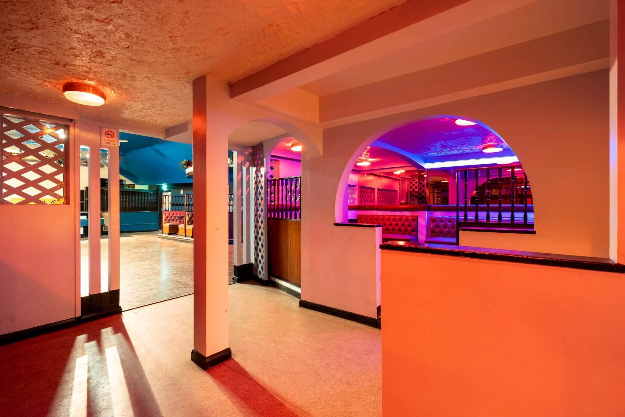 apollo-club-foyer-arches-warm-lighting.jpg