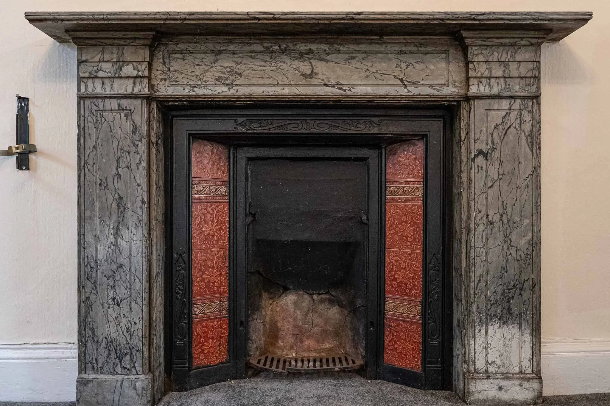 marble-fireplace-red-tiles.jpg