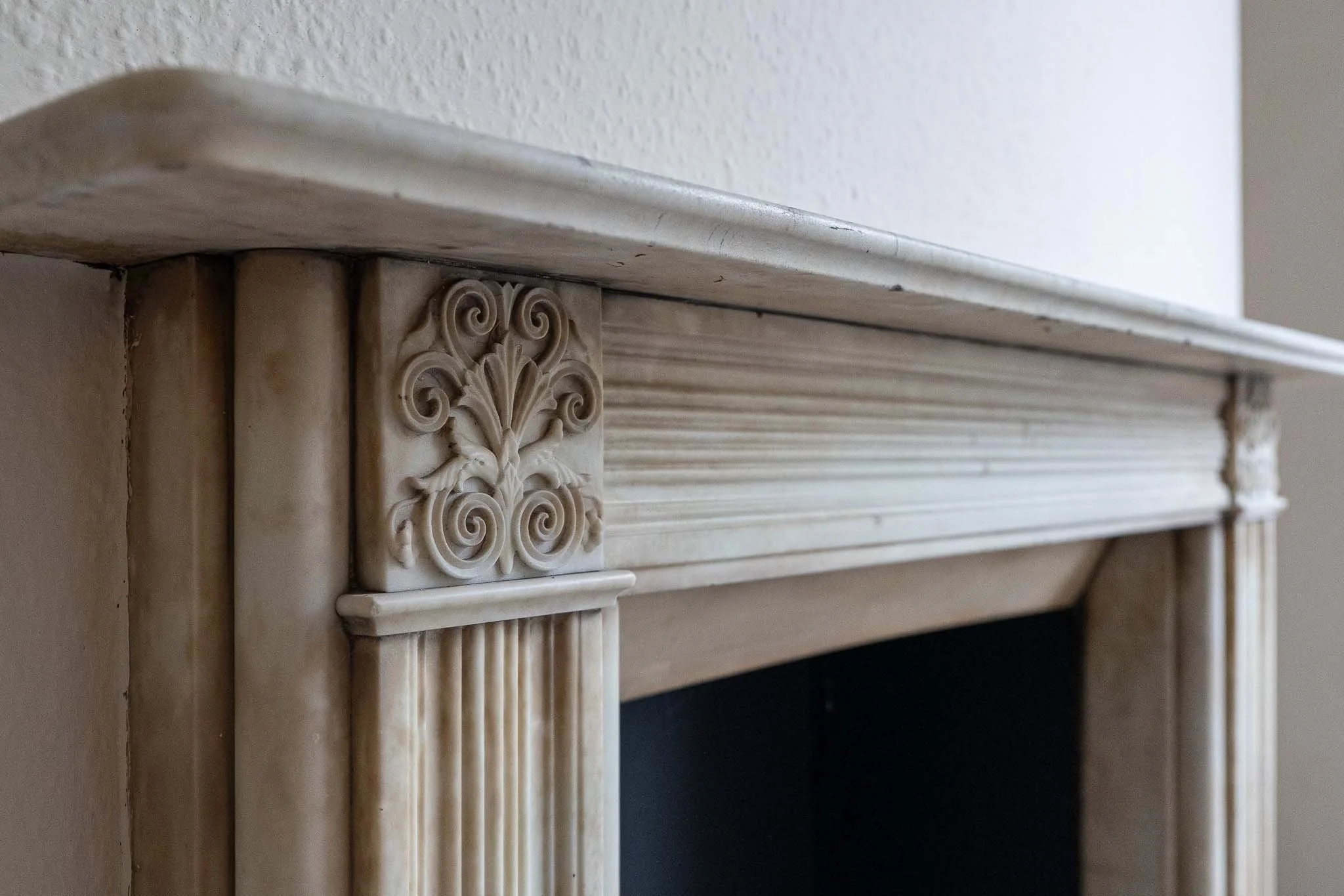 stoke-newington-fireplace-detail-carved-corner.jpg
