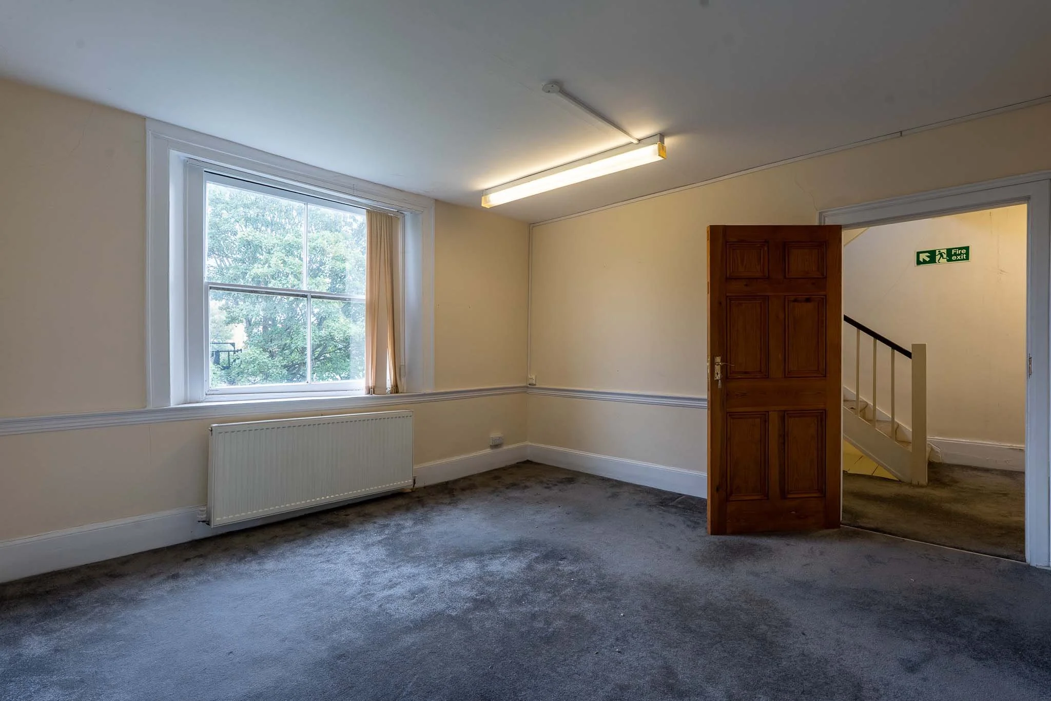 n16-empty-room-window-stairs.jpg
