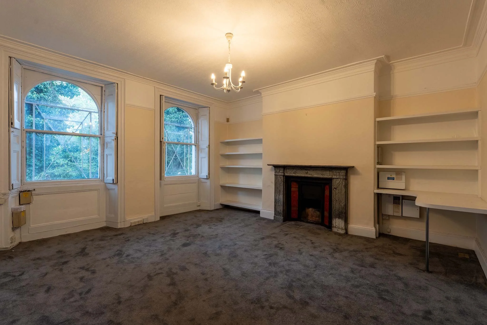 stoke-newington-room-arched-windows-shelving.jpg