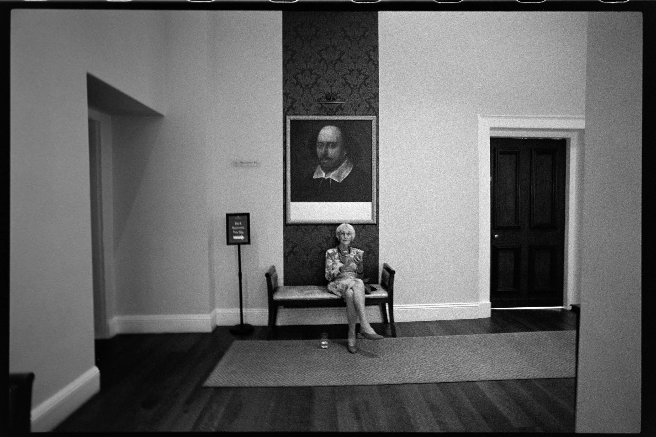 Grandma sits underneath artwork portrait at Hensol Castle