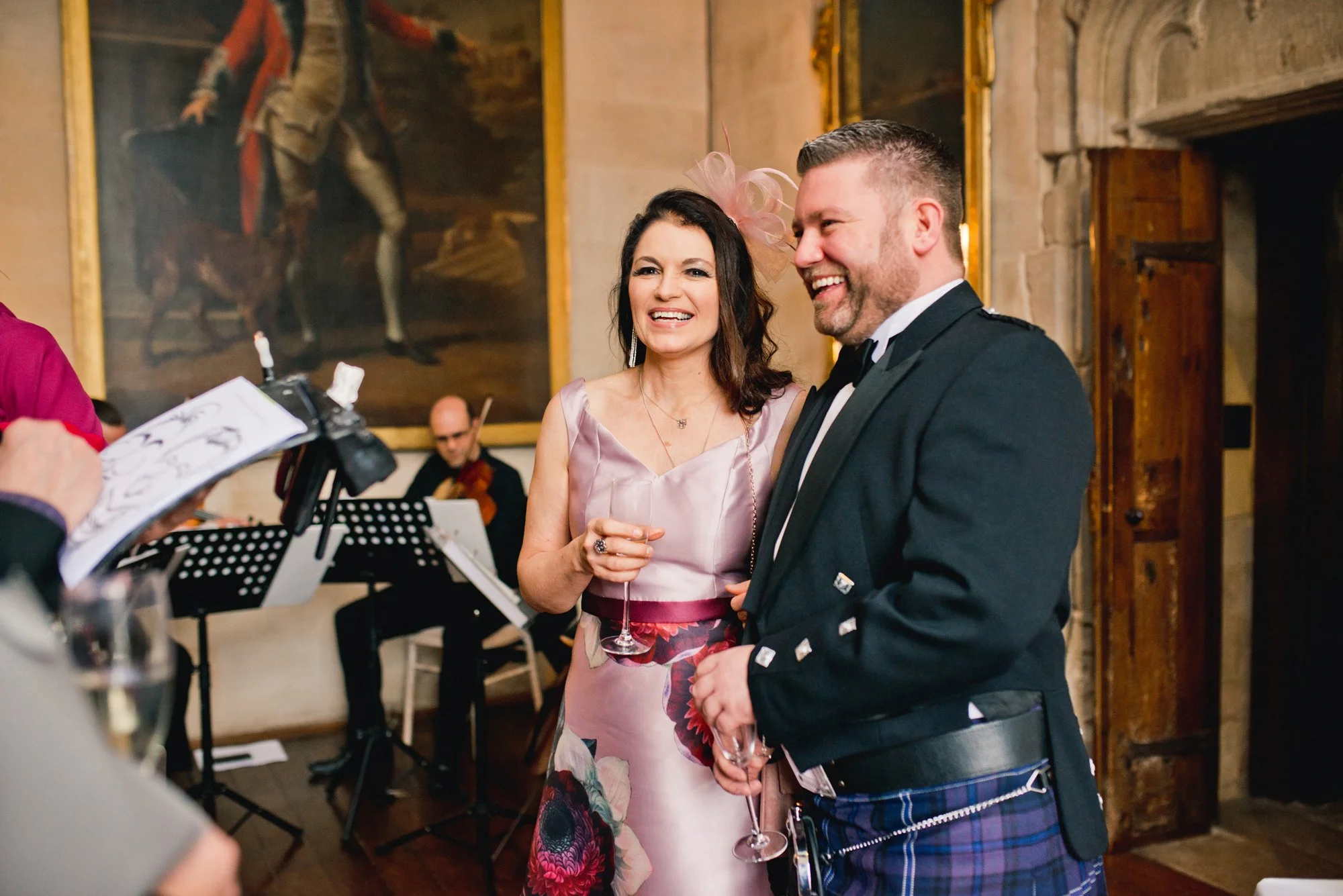 wedding guest candid during a reception at Berkeley castle