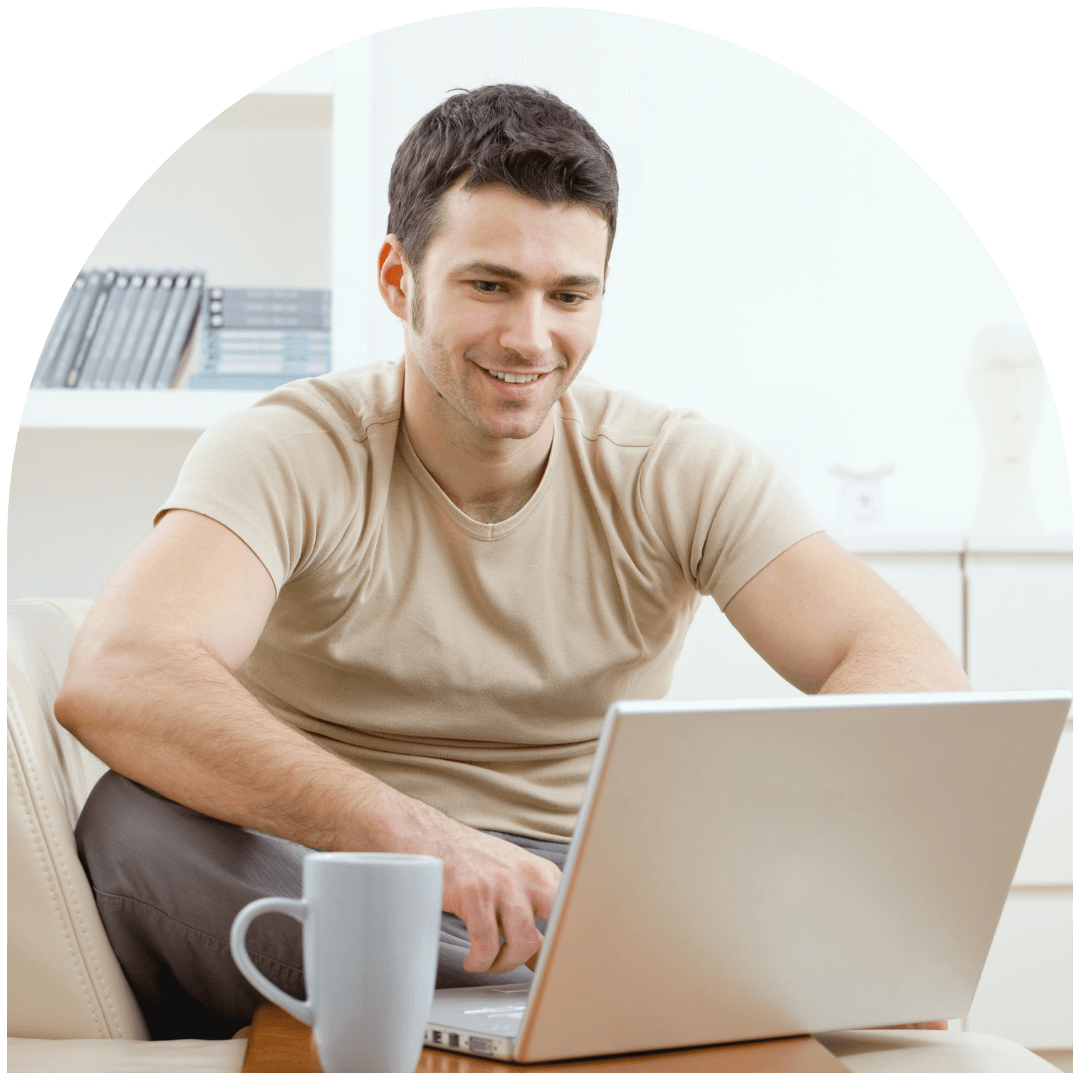 Man drinking coffee during an online therapy session