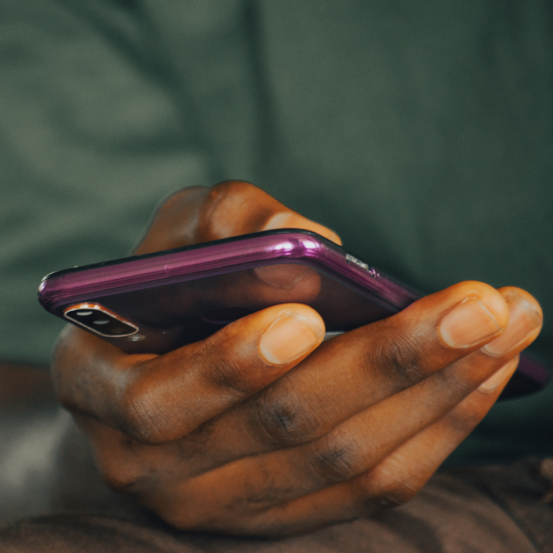 Close-up of a phone screen showing an unanswered text message