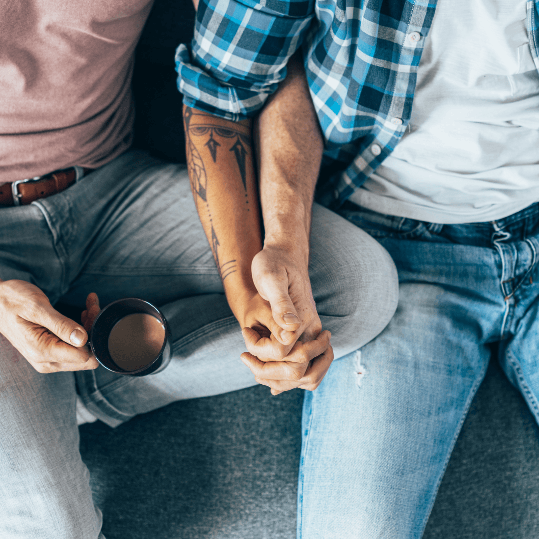 Image of a couple holding hands and coffee representing Secure Attachment Therapy