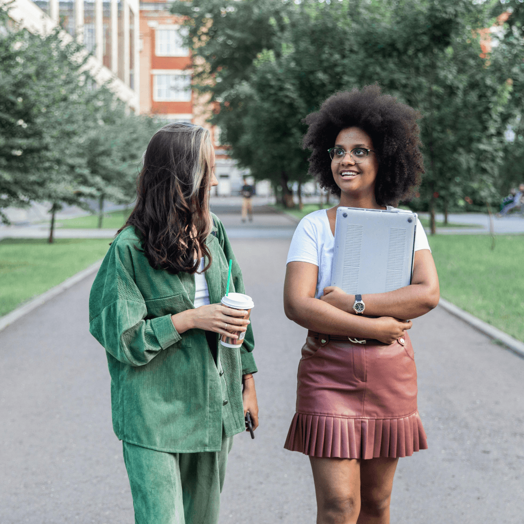 Image of girls talking outside representing attachment therapy.