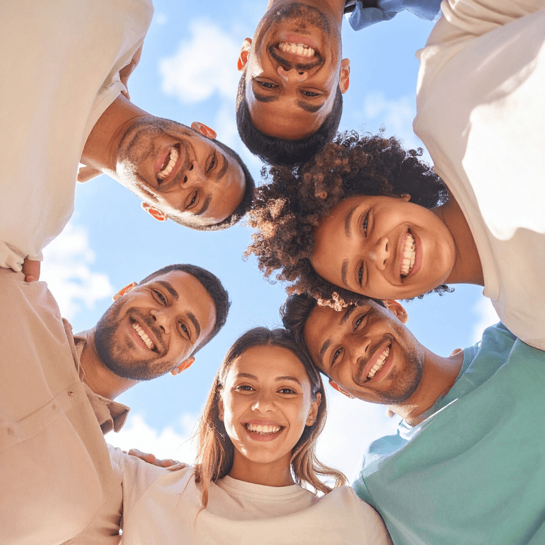 Image of a group of friends huddling representing Anxious Attachment Style