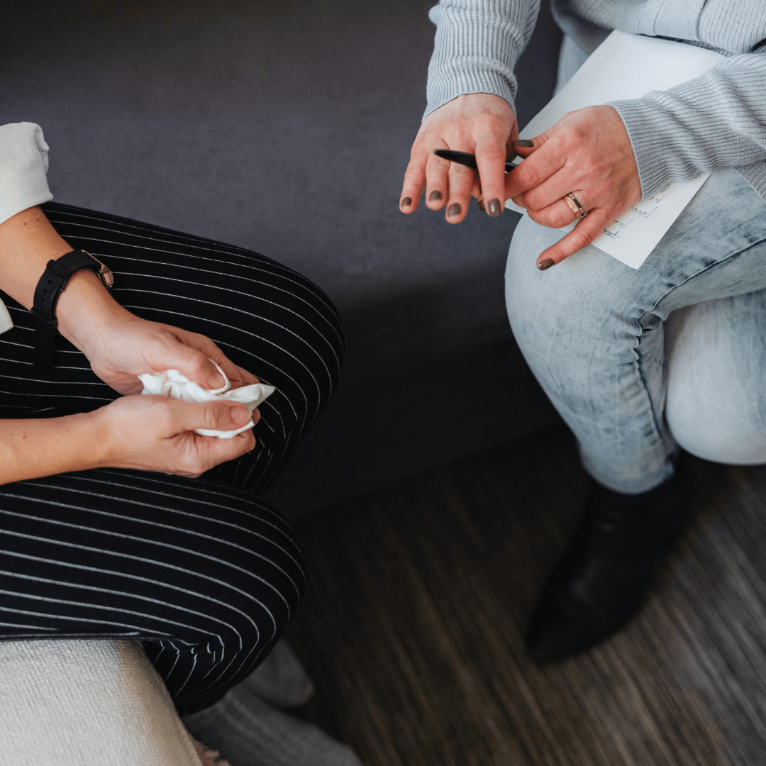Image of a girl sitting in therapy representing EMDR Therapy