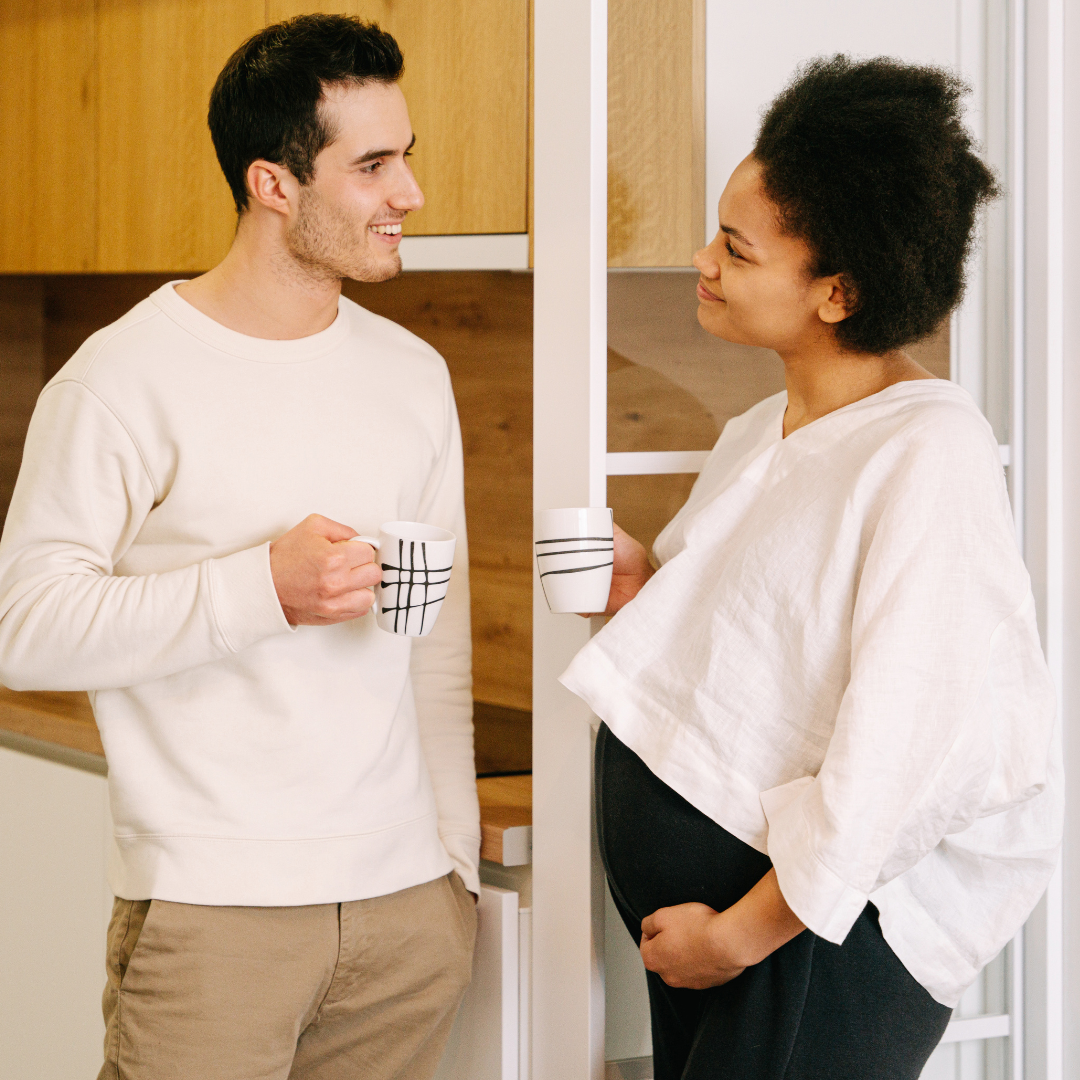 Image of a couple chatting having coffee representing attachment therapy