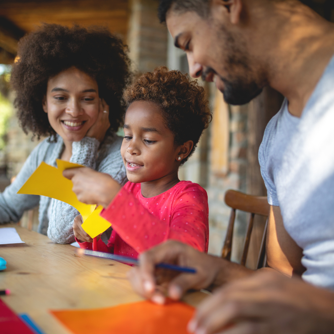 Image of a family doing crafts representing new years resolutions and anxiety therapy in Orlando.