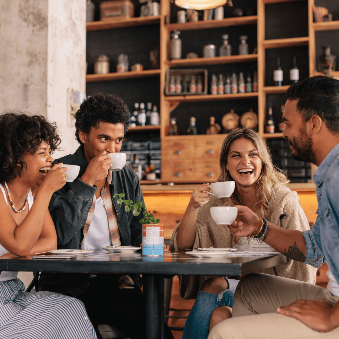 Image of friends drinking coffee representing trauma therapy