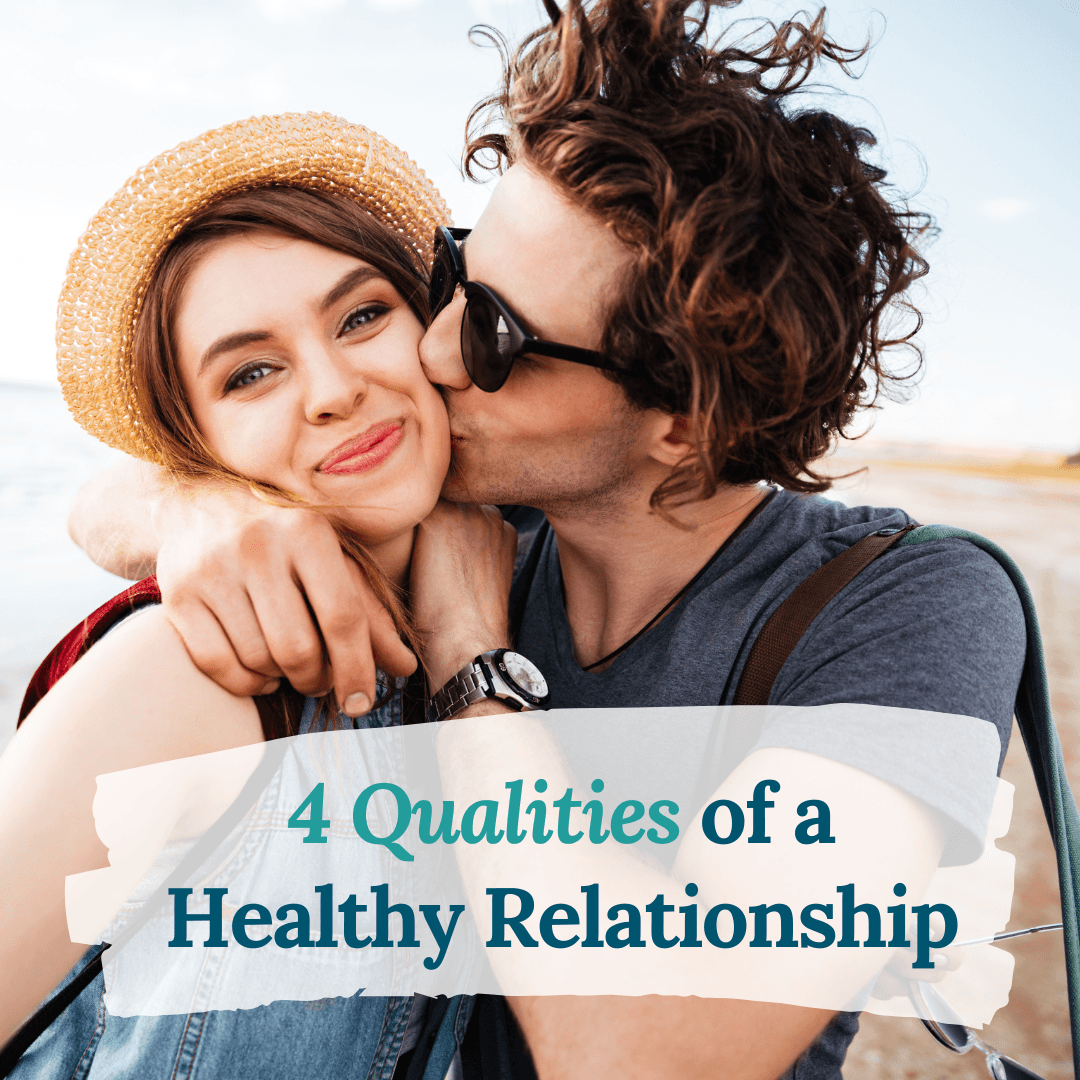 Image of a couple kissing on the beach representing attachment therapy