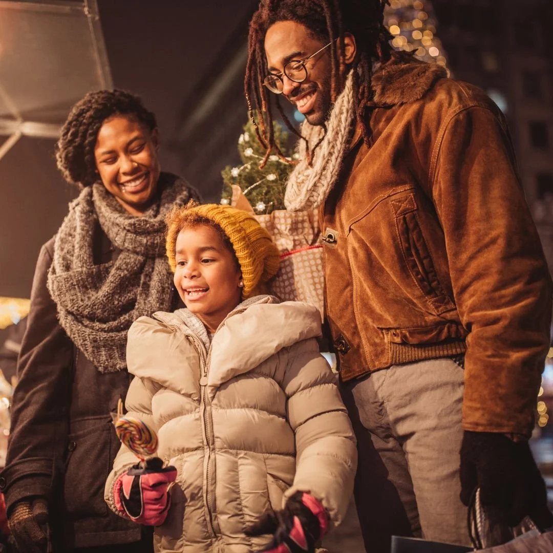 Shows a family looking at holiday decorations during the holiday season. Represents how anxiety therapy in Orlando, FL can help