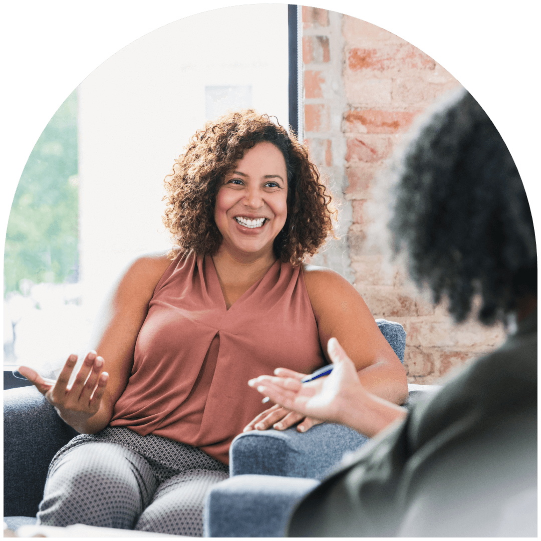 Woman smiling during a therapy session