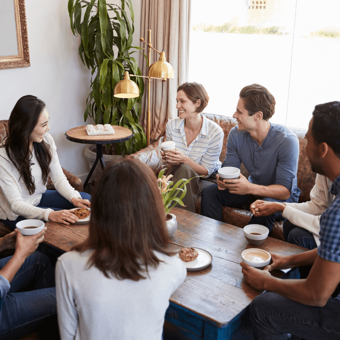 A group of friends reflecting while dealing with self-doubt, illustrating strategies shared by a trauma therapist in Eola Heights, Orlando.