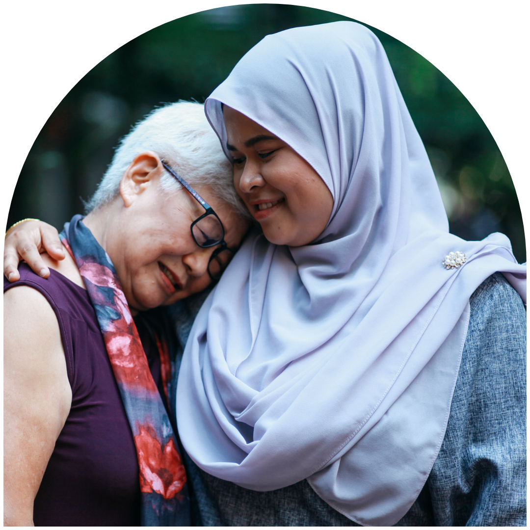 Two women embracing in support