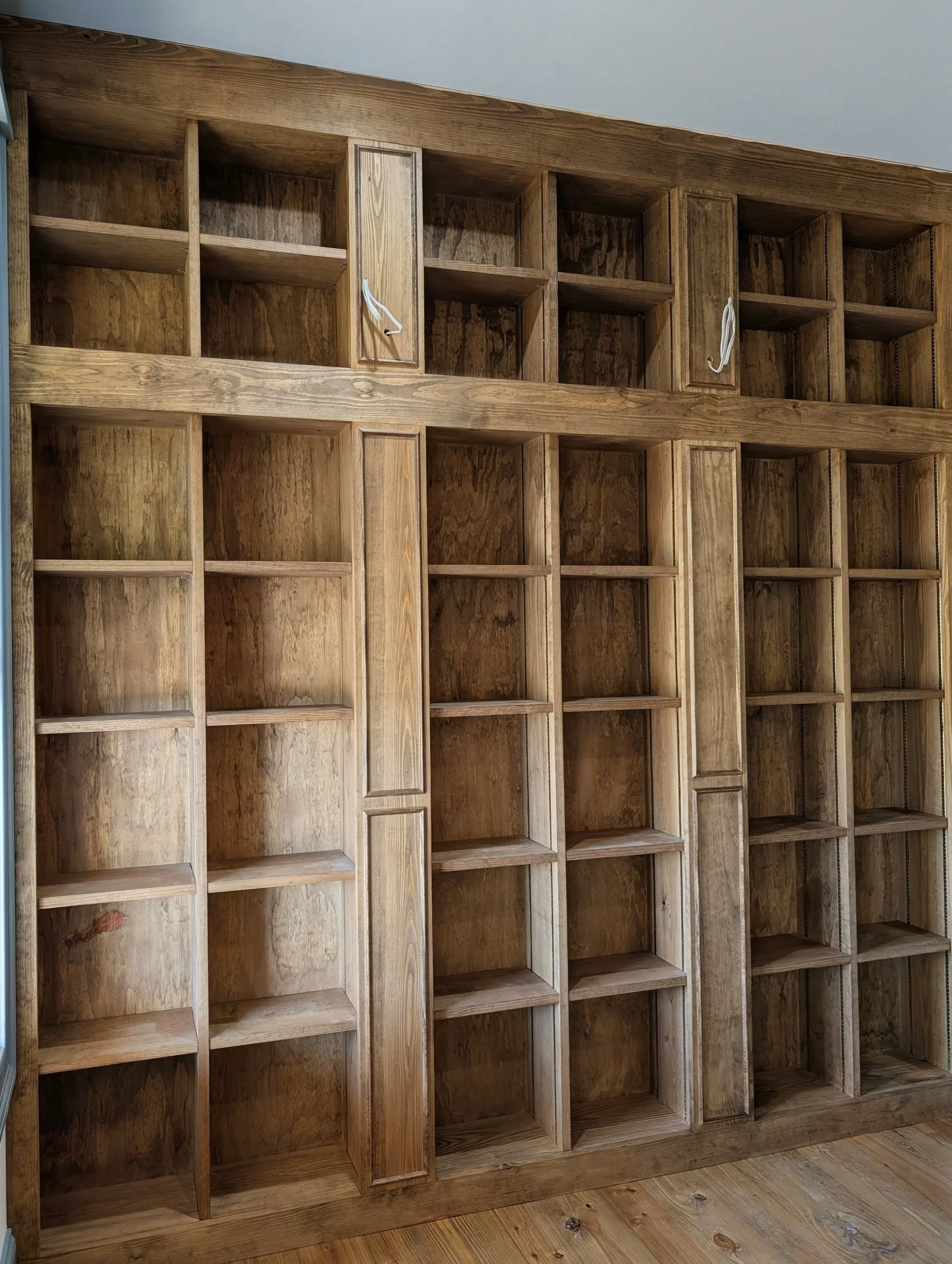 Hand built custom library with adjstale shelves