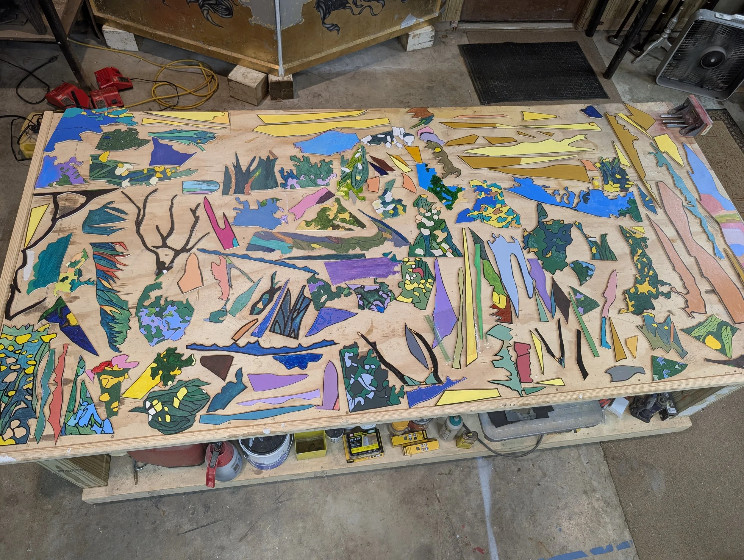 Mosaic of Hope (Detail) | Modular plywood tile inventory across workbench
