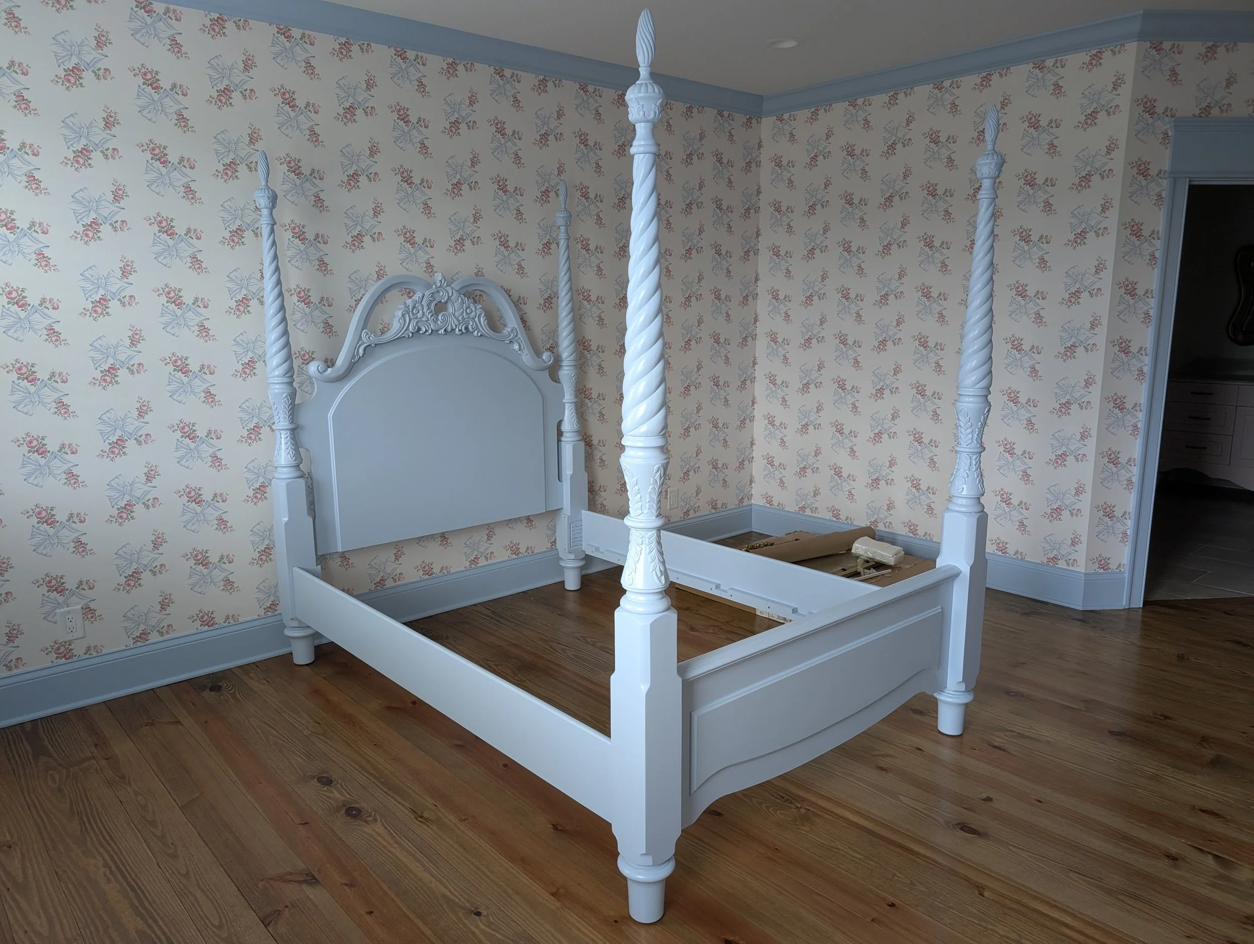 Refinished Four-Poster Bed Frame | Custom enamel refinishing on an ornate wooden four-poster bed frame with carved headboard details
