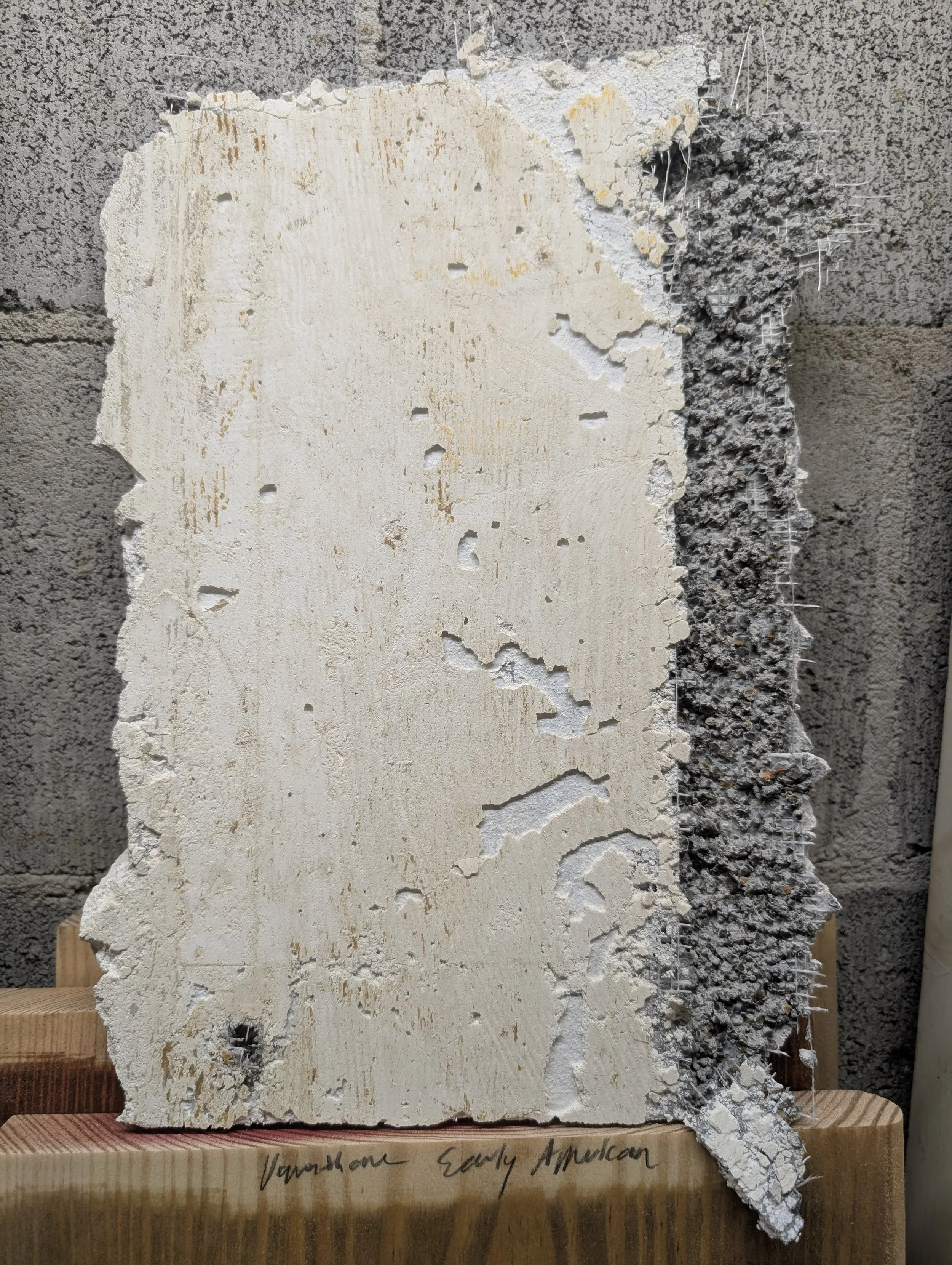 Reclaimed Tile Substrate (Detail) | Fragmented cementitious surface with exposed fiberglass mesh