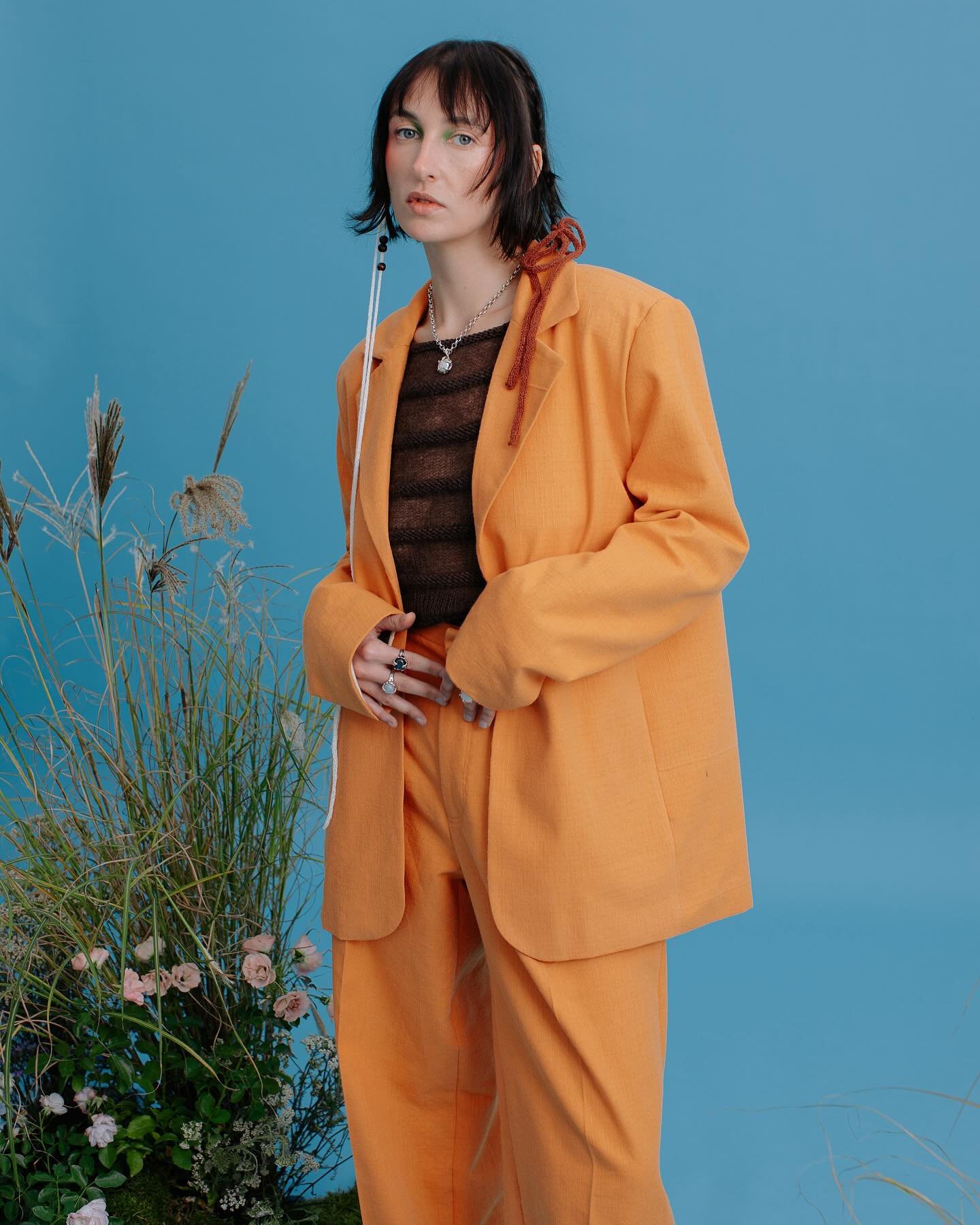 'Sunray'-Suit 🧡🍊

The 'Sunray'-Suit is made out of deadstock material, that&rsquo;s why this piece is limited to only one suit. It has an over size cut and can be perfectly worn by all genders.
We are so in love with this suit because the color is 