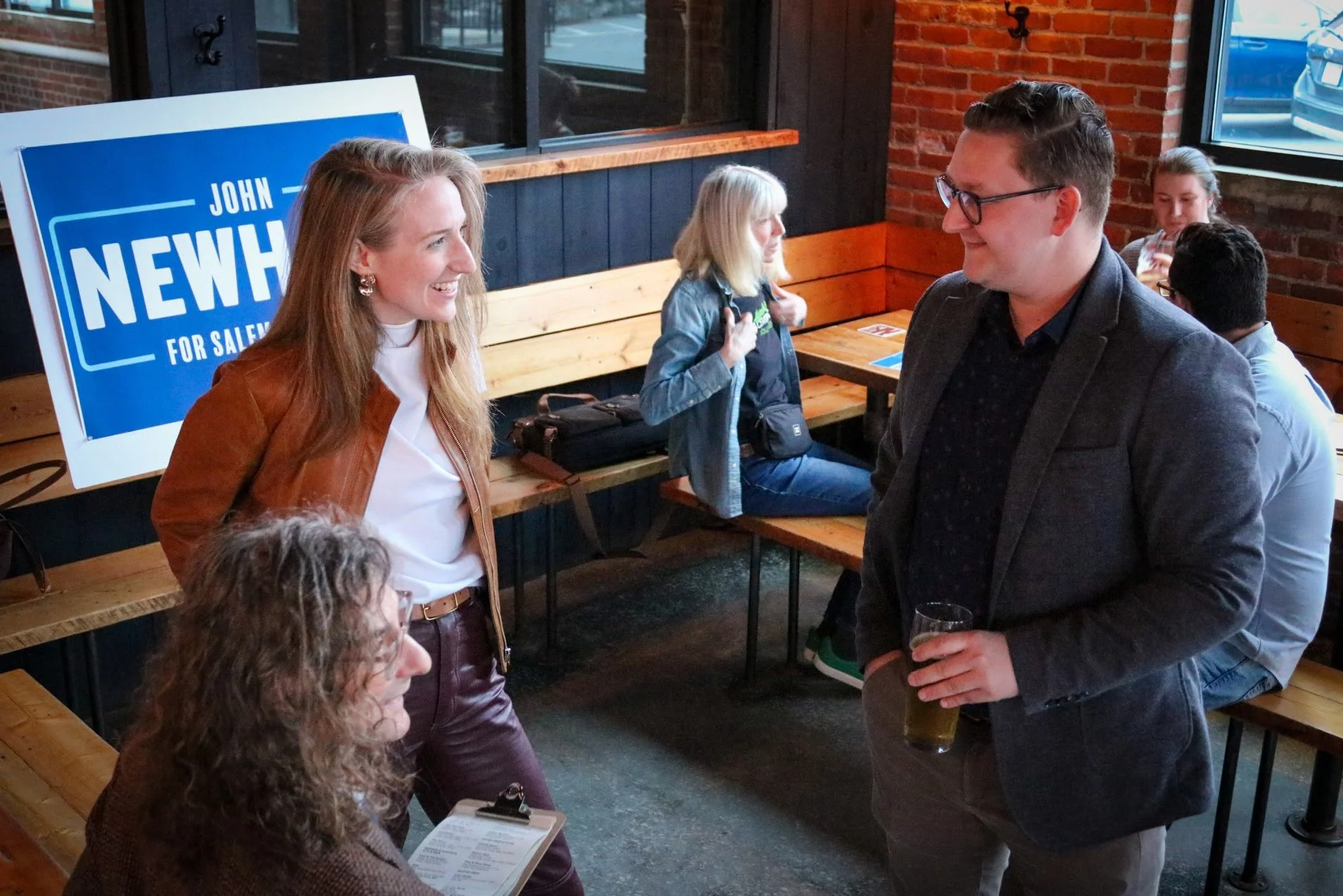 John at a campaign event in conversation.