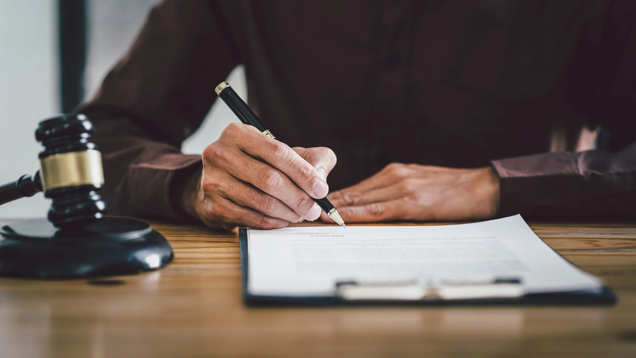 lawyer reading through architect firms' policies