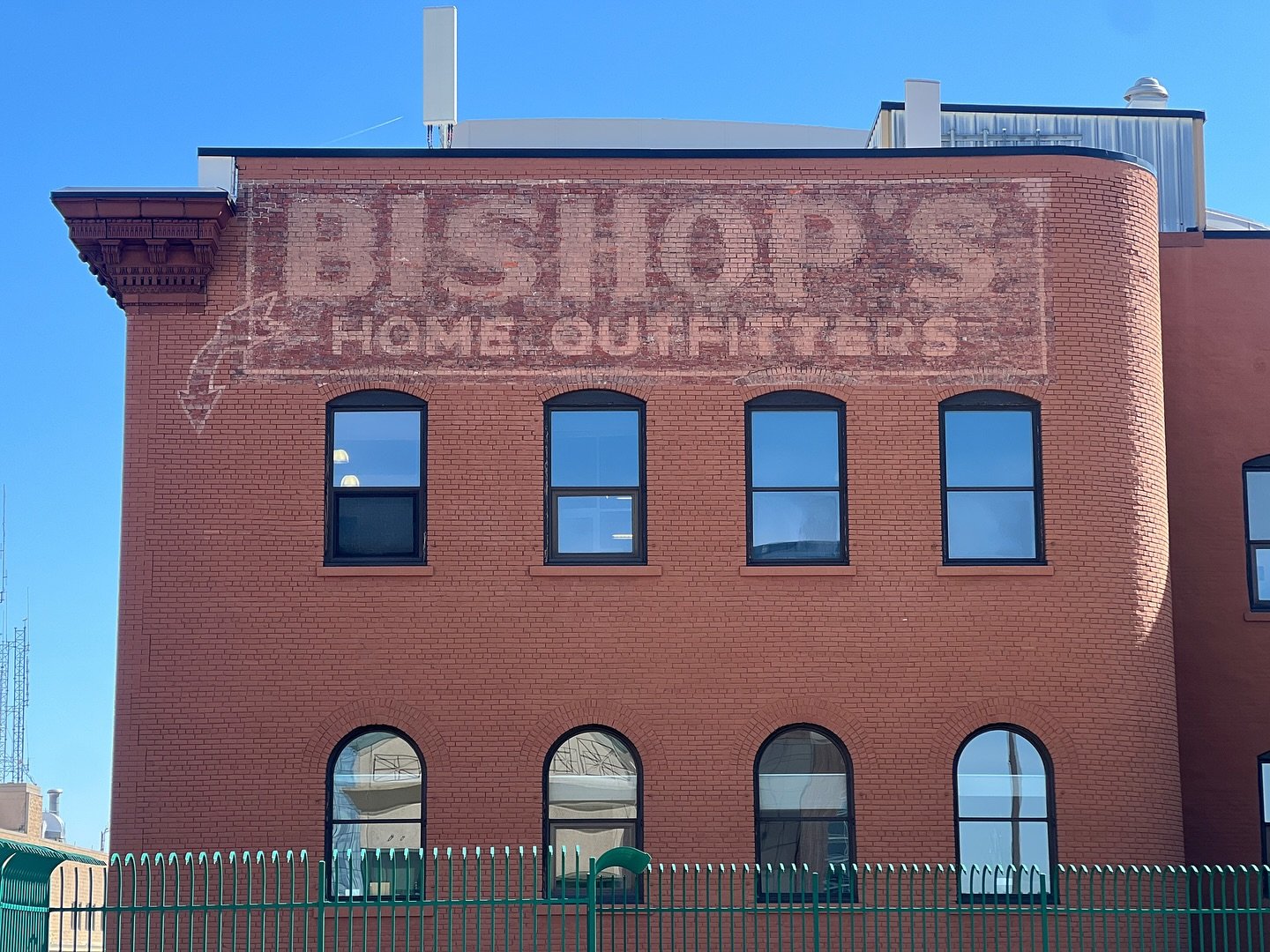 Bishop&rsquo;s Home Outfitters painted sign at 50 Louis