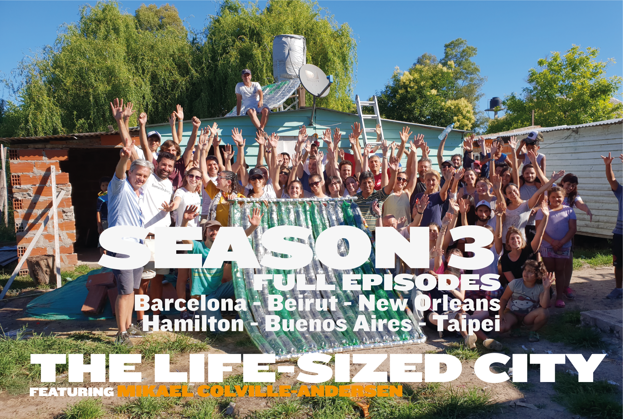 A large group of people outdoors, smiling and raising their hands, with a house and trees in the background. Overlay text indicates this is from Season 3 of a series with episodes set in various cities, featuring Mikael Colville-Andersen.