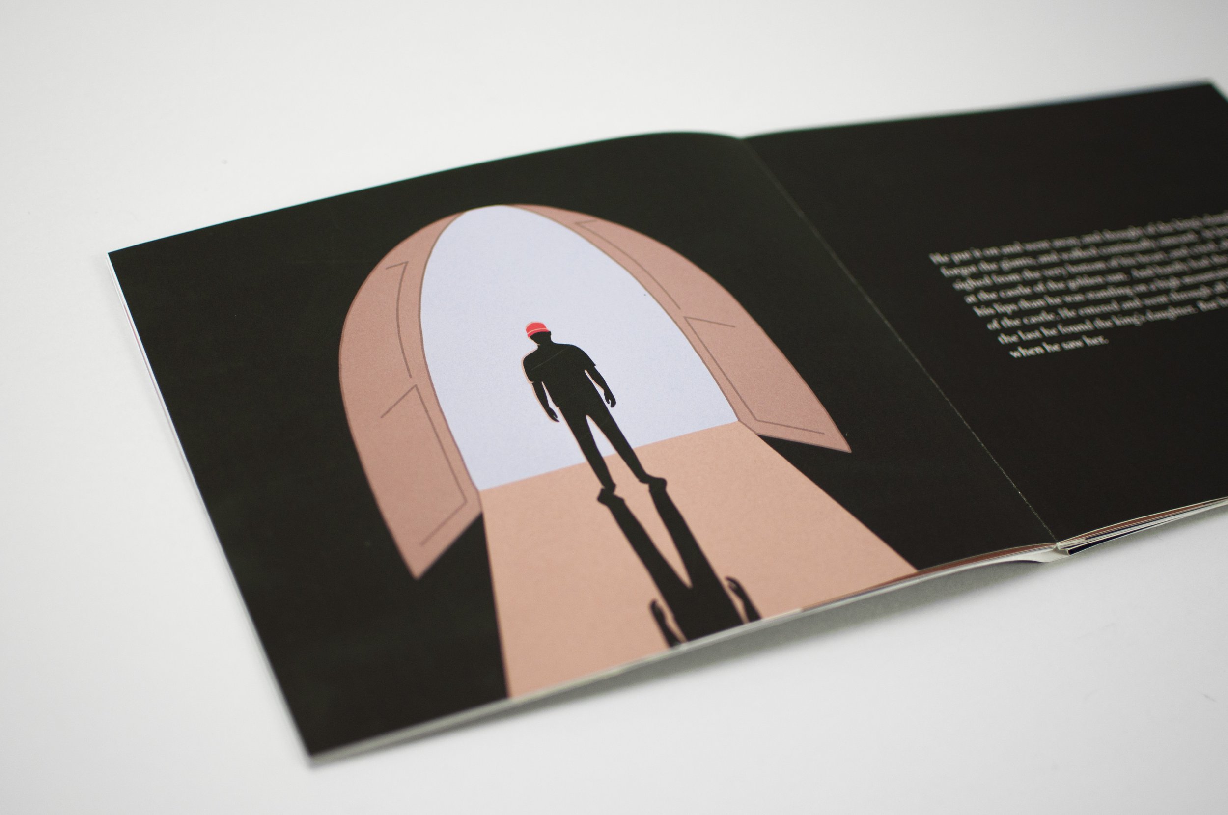 Interior spread of The Crystal Ball man standing in doorway wearing the red hat