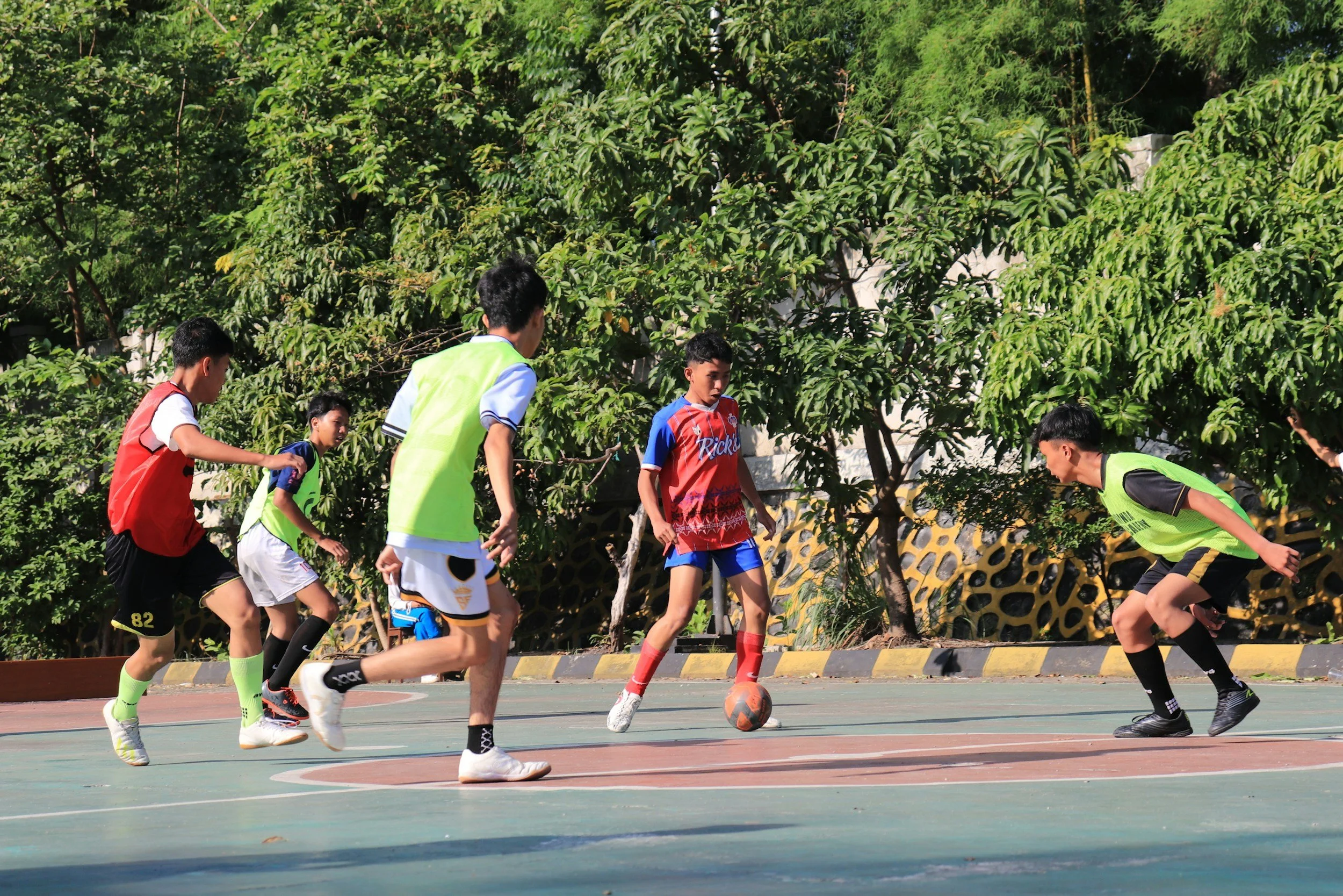Children playing football.