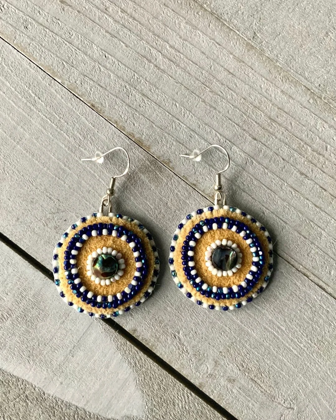 tannedhide-flatbead-blue-seedbead-handmade-beadedearrrings1.jpg