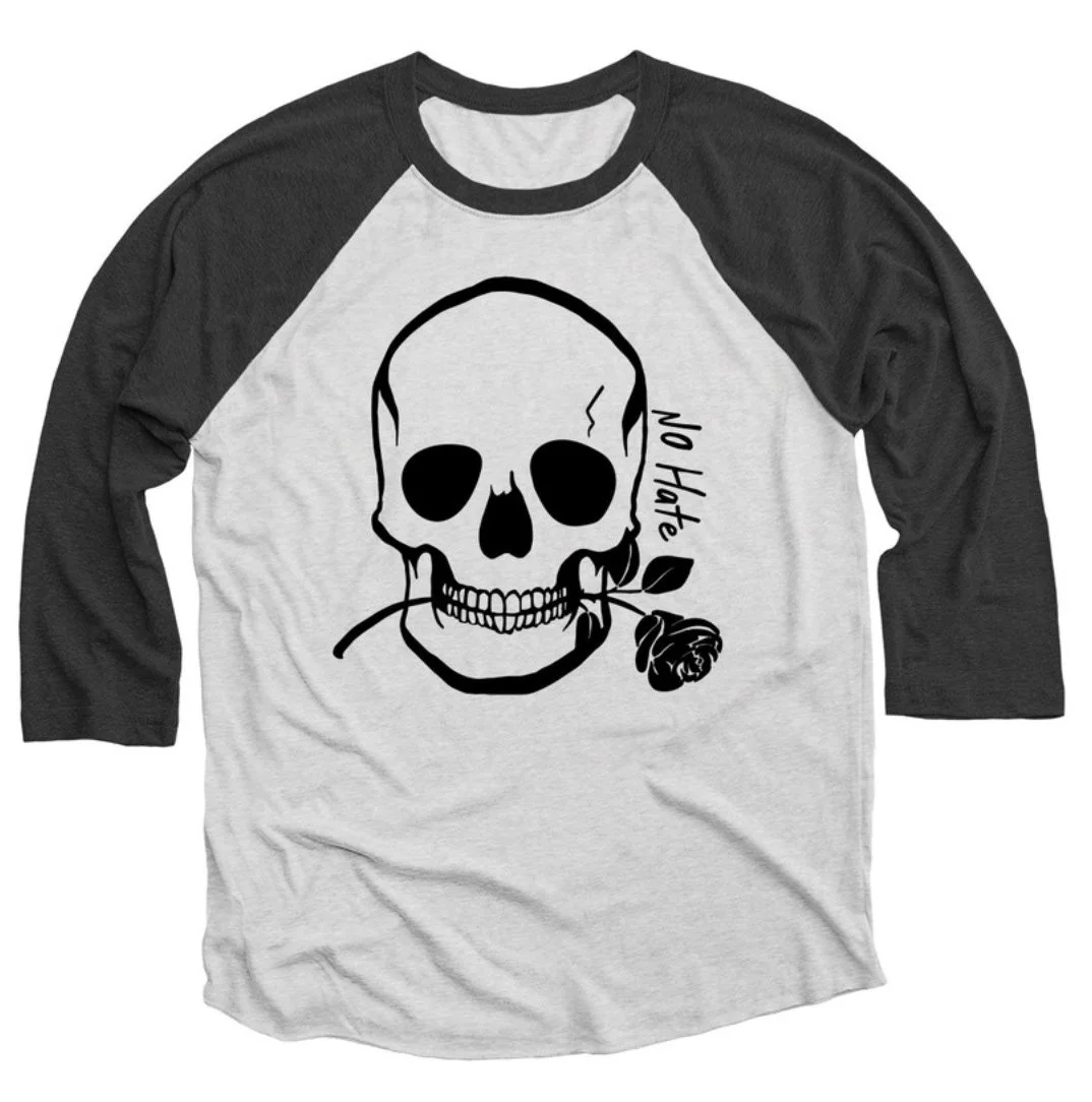 Gray and black baseball tee with a large graphic of a skull holding a rose in its mouth and a small crack on the skull's top, accompanied by the words "No Hate" written vertically.