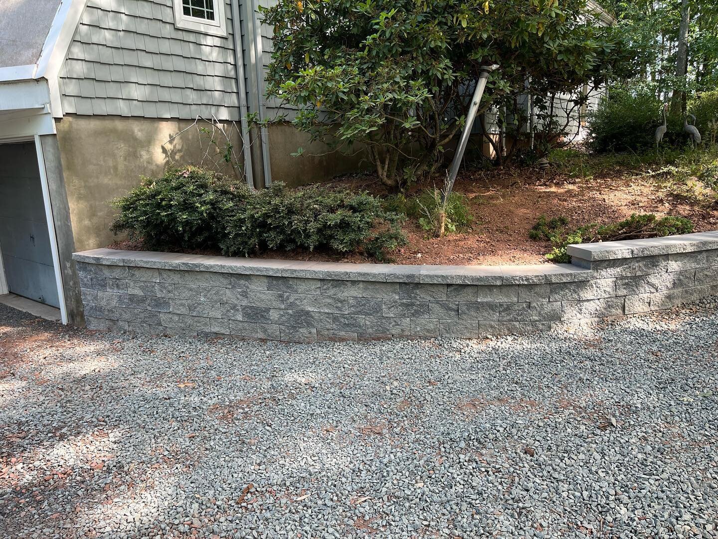 A much needed retaining wall and drainage upgrade ✅ functional AND clean looking 💯💪🏼 hardscapenj #wallblock #techobloc #retainingwalls @demarcobrothersinc