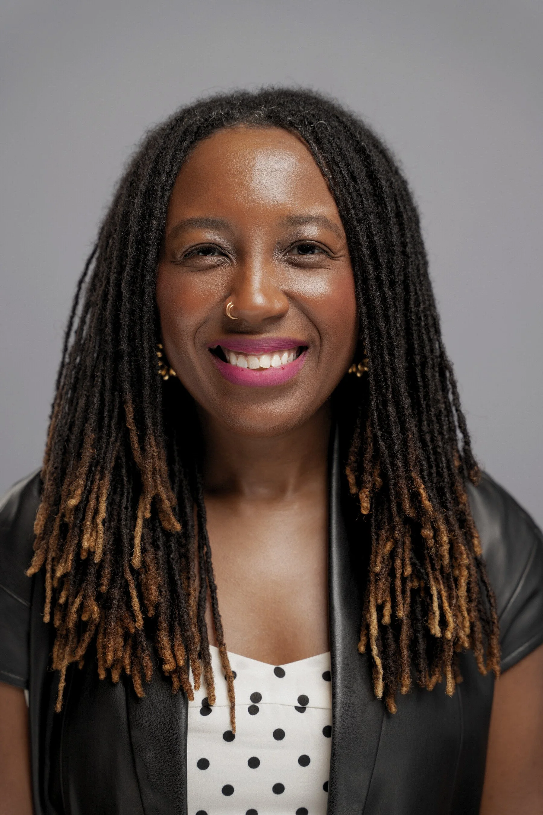 Image: front-facing studio headshot Alt text: Jessica Thomas, LMHC, LPC — Black therapist in Brooklyn, licensed in New York, Florida and Washington D.C.