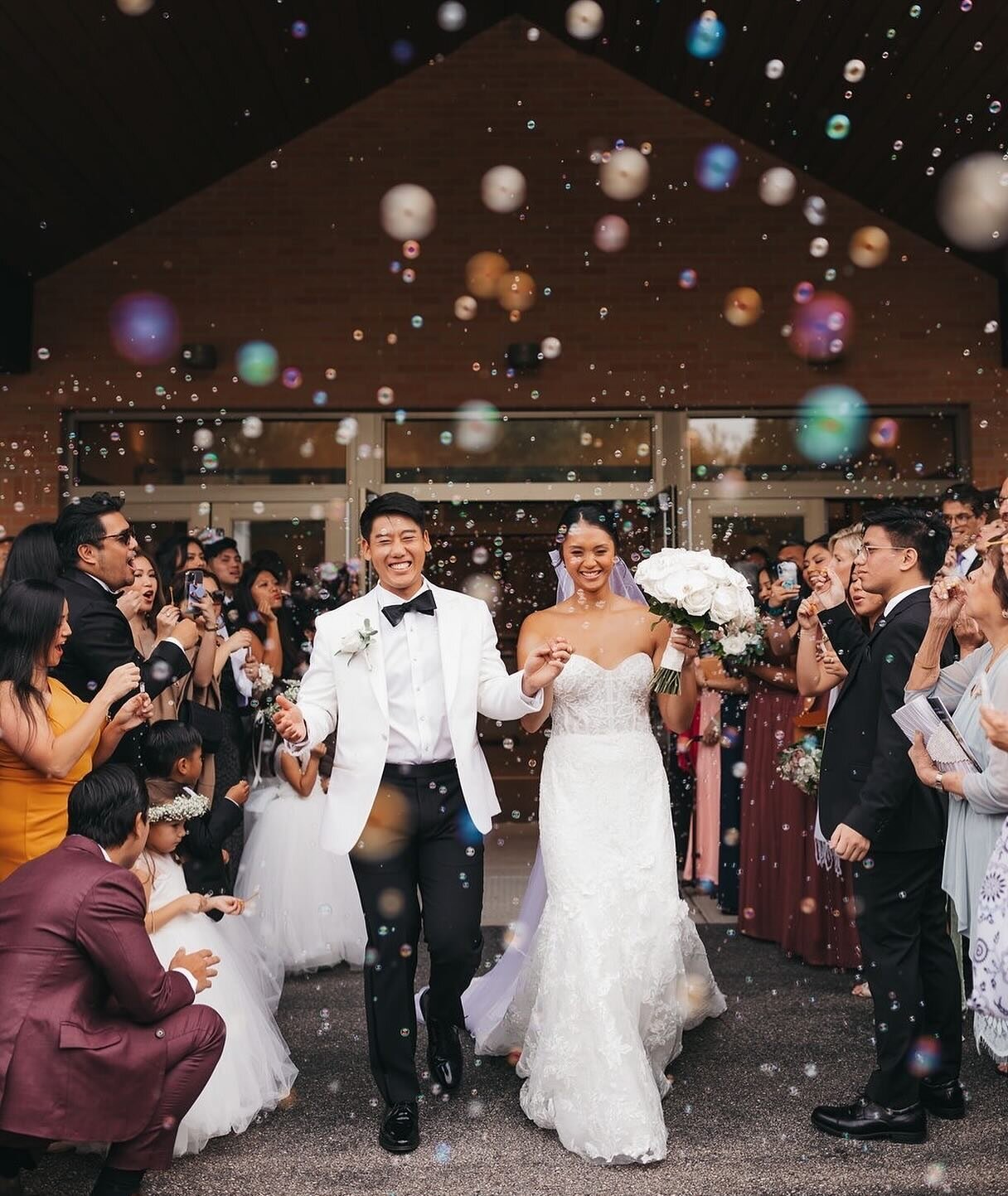 Stepping out into wedded bliss, one bubble at a time! 🎉💍 Here&rsquo;s to a lifetime of joy, laughter, and endless bubbles of love. 🤍

Planning: @urbanallureevents 
Venue: @michiganshoresclub
Photo: @sarahjanebradleyphotos
Video: @josephlotz_