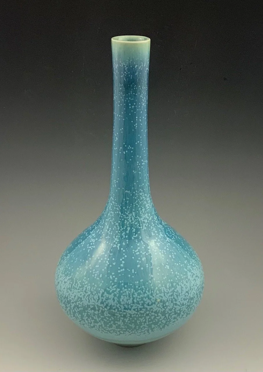 Blue bottle with crystals 11" x 5" $1,800. can be seen now till November at the Farnsworth museum 